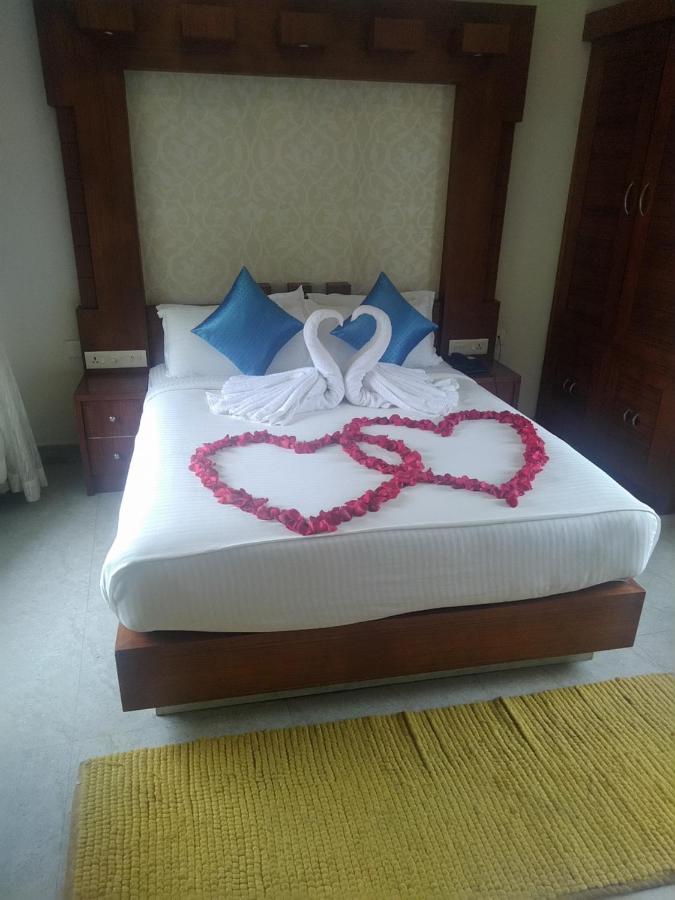 Monsoon Grande Hotel Munnar Buitenkant foto