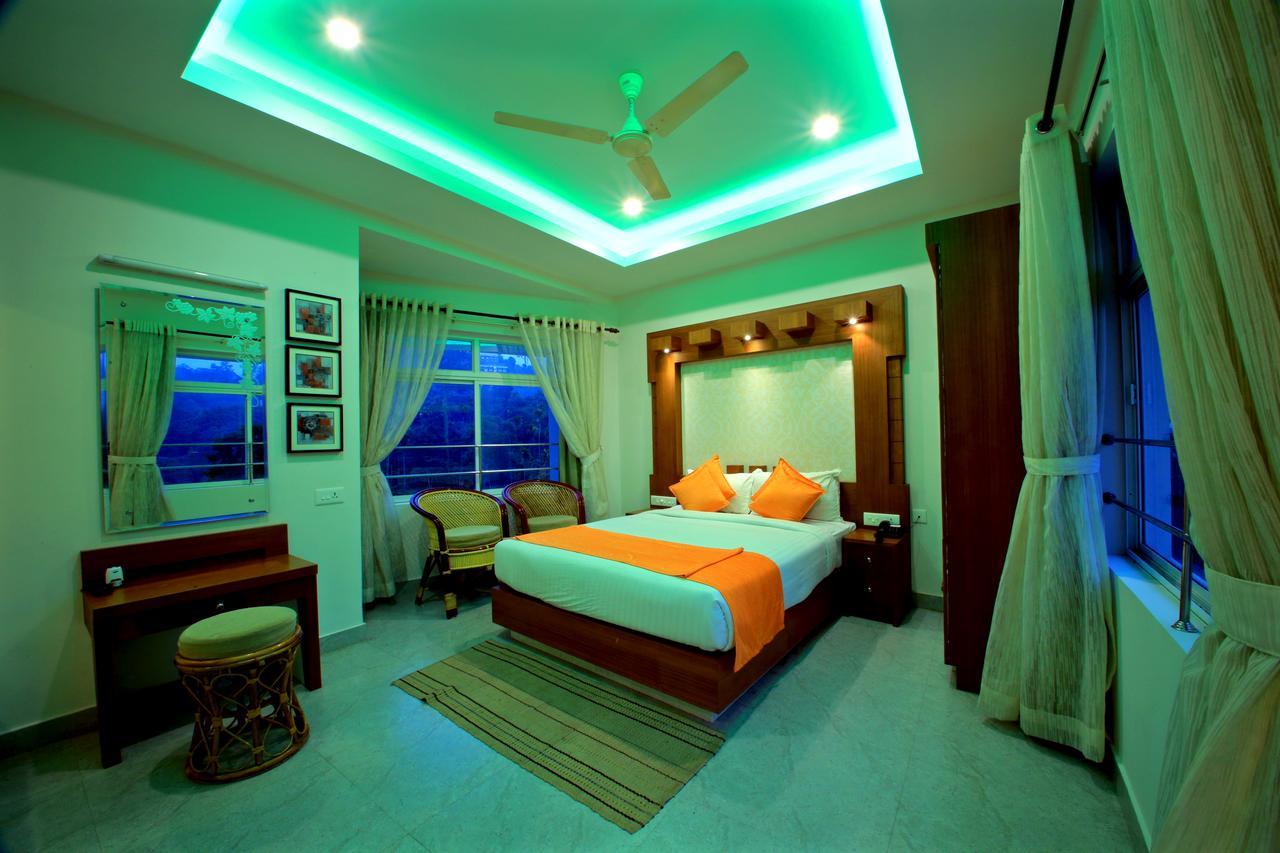 Monsoon Grande Hotel Munnar Buitenkant foto