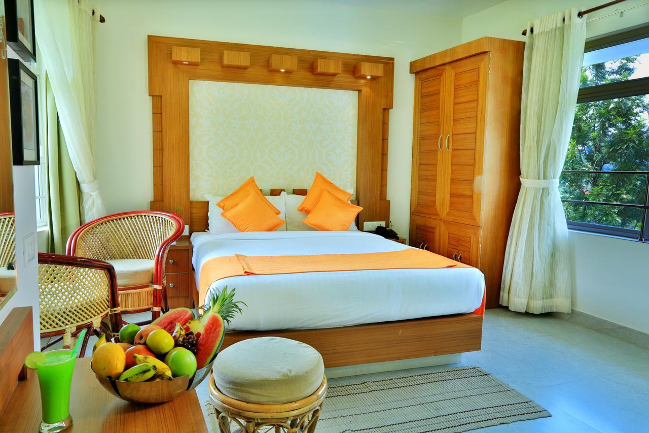 Monsoon Grande Hotel Munnar Buitenkant foto